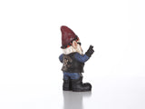 Biker garden gnome statue wearing a helmet, sunglasses, leather jacket, and skull shirt with GARDEN OUTLAWS GNOMAD design