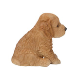 Pet Pals brown sitting Cockapoo puppy statue made from polyresin for indoor and outdoor home and garden décor.