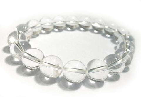 Polished crystal stretch bracelet with round gemstone beads