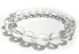 Polished crystal stretch bracelet with round gemstone beads