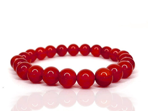 Polished red agate stretch bracelet with round gemstone beads