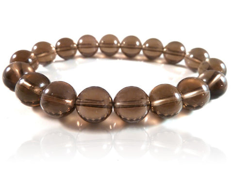 Polished smoky quartz stretch bracelet with round brown gemstone beads