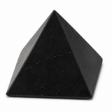 A polished black pyramid stone figurine, likely made of obsidian or black tourmaline, shown on a clean white background. Large