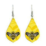 Adam Lewis Gilakas'la Thank You Gallery Collection earrings featuring Kwakwaka’wakw pollinator artwork.

