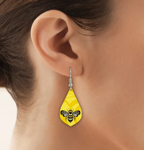 Adam Lewis Gilakas'la Thank You Gallery Collection earrings featuring Kwakwaka’wakw pollinator artwork.

