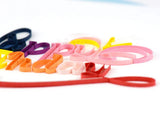 Birthday paper quilling greeting card with vibrant rainbow-coloured lettering