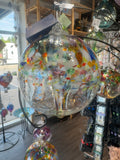 Kitras Tree of Phoenix hand-blown iridescent art glass ornament with multicoloured tree design.

