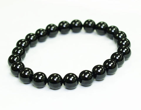 Polished black tourmaline stretch bracelet with round gemstone beads