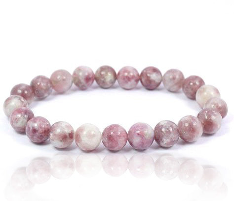 Polished pink tourmaline stretch bracelet with round pink gemstone beads