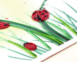 Quilled Ladybug greeting card with ladybug climbing dew-covered grass paper quilling design