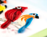 Quilled Songbird greeting card with cardinal, hummingbird, and colourful birds on a branch

