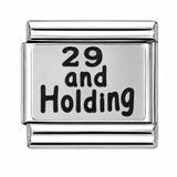29 and Holding stainless steel Italian charm