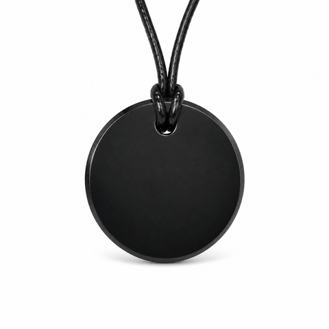 Round black Russian Shungite pendant on black cord, front view