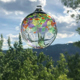 Hand-blown Tree of Life glass ornament featuring detailed internal branches