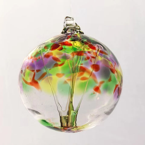 Tree of Life hand-blown glass ornament with internal tree design by Playful Flame Glassworks