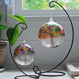 Close-up of Tree of Summer hand-blown glass ornament showing vibrant summer glass leaves